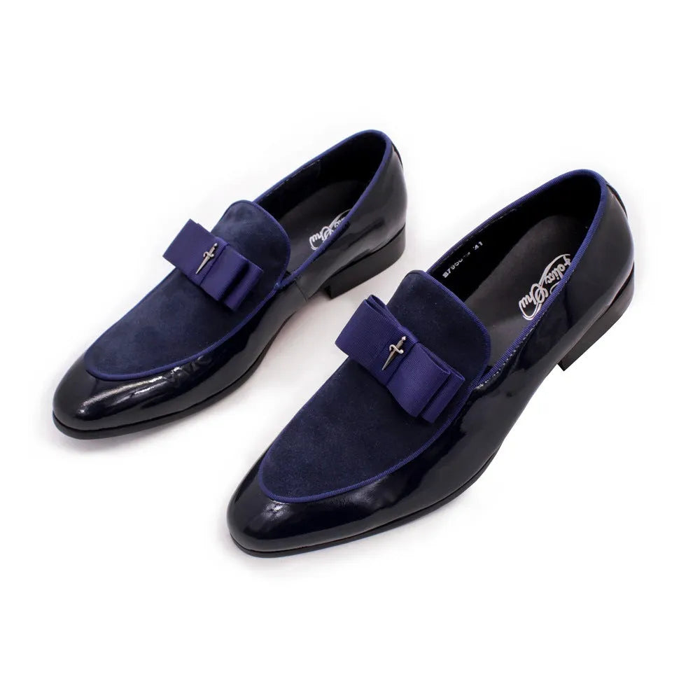 Men's black patent leather dress shoes with a tassel detail and low-top design on a rubber sole.