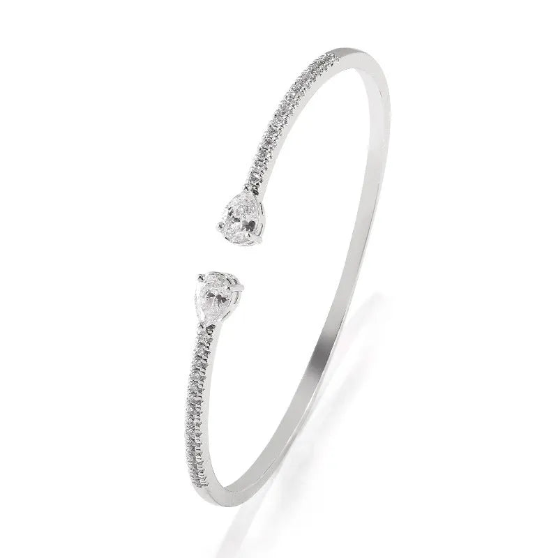 Multi-zircon copper bracelet with inlaid stones in blue or white colour options