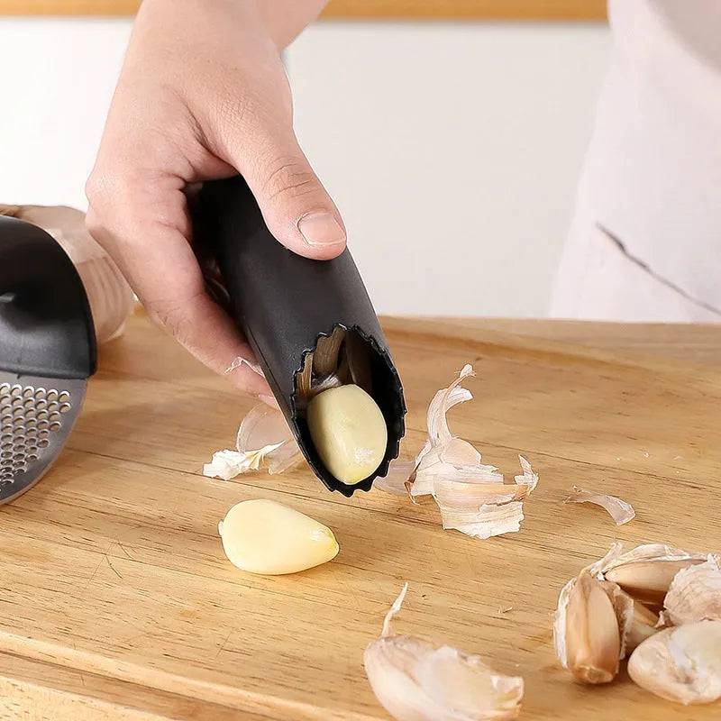 304 stainless steel garlic press in black, blue, green, or pink with modern design