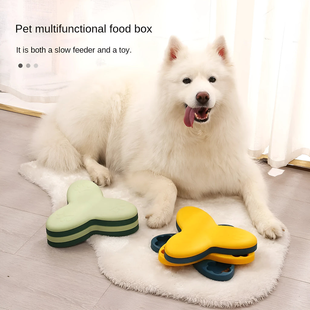 Green and yellow interactive dog puzzle toy with rotatable compartments and bone-shaped covers