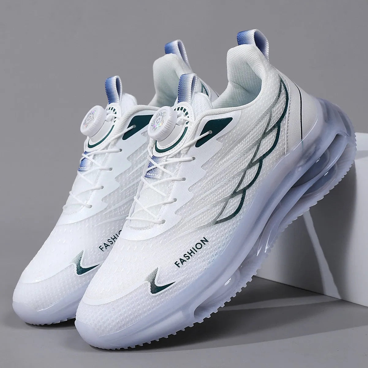 White youth sports casual shoes with rotating button and lace-up closure, mesh upper, and rubber sole.