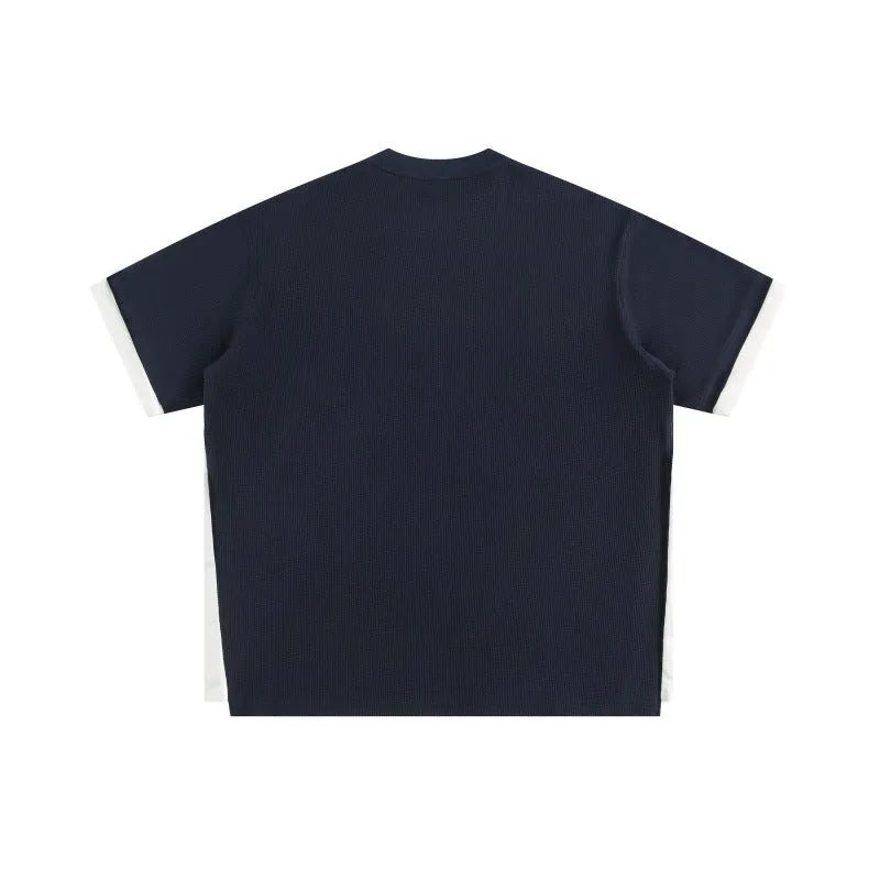 Retro alphabet embroidered waffle t-shirt in loose pullover style with short sleeves