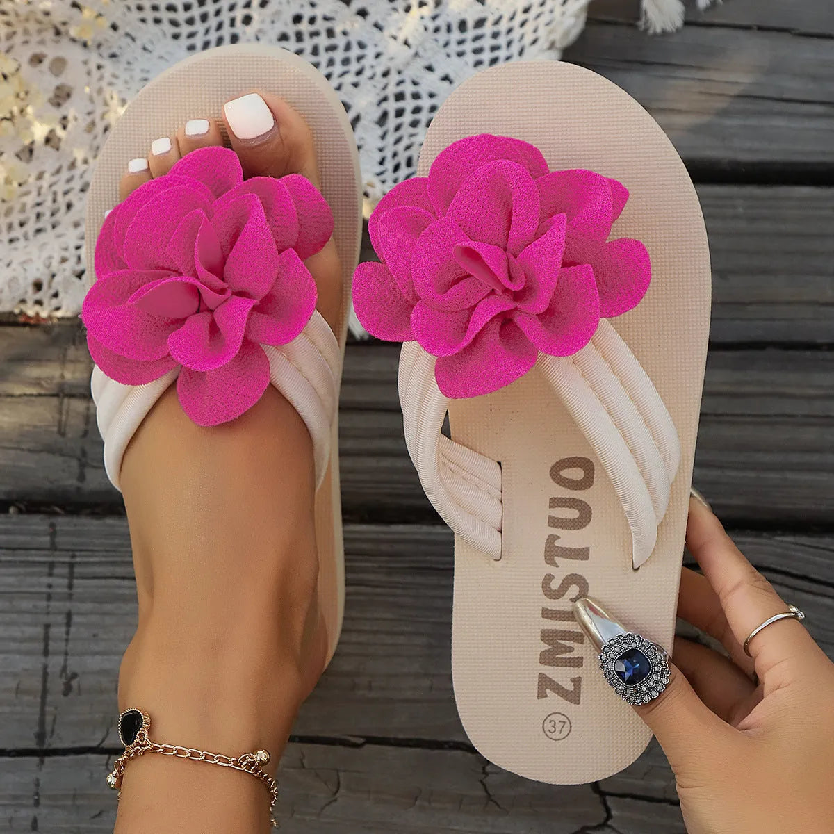 Women's plus size floral flip flop slippers in solid green colour, showing round toe shape