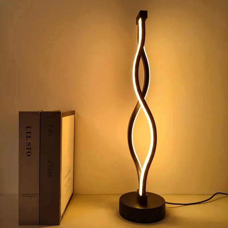 Black aluminium desk lamp with three-colour dimming button and touch-sensitive blue pink areas