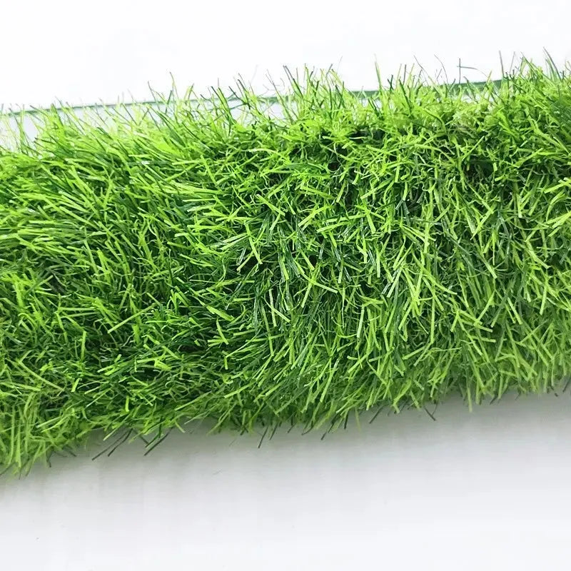 Green artificial grass dog toilet training mat showing realistic turf texture for pet familiarity