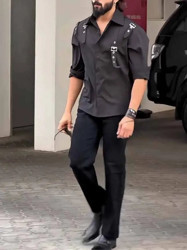 Black men's utility-style button-up shirt with a regular fit on a hanger.