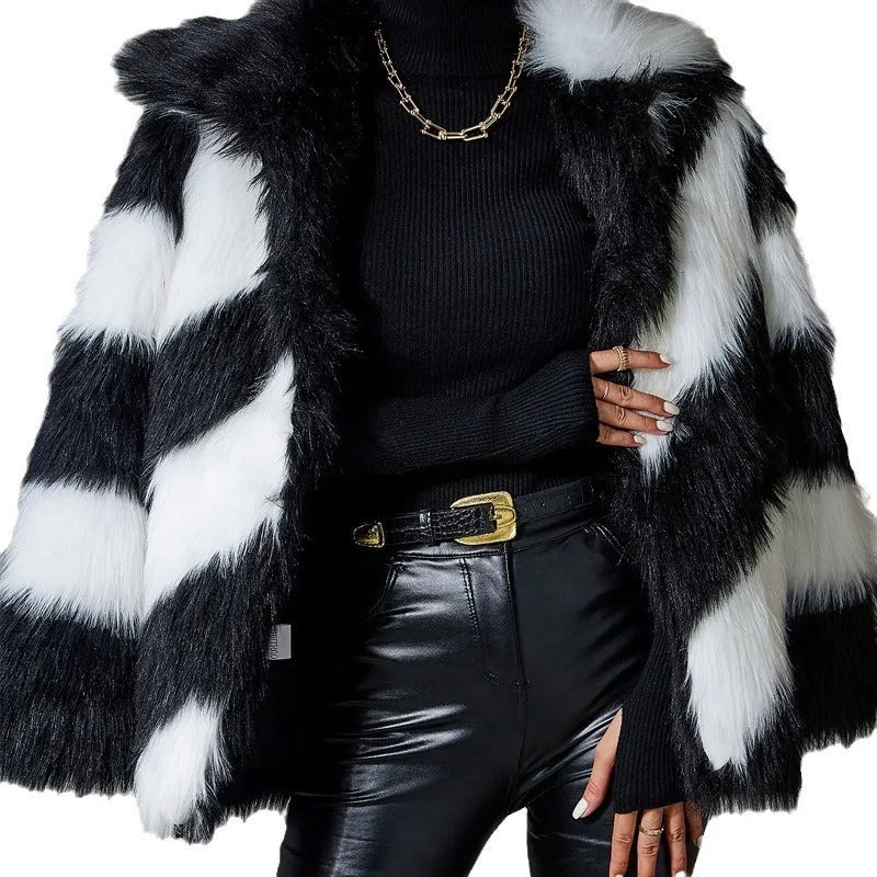 Women's faux fur coat with contrasting colour lapels and a fur collar.