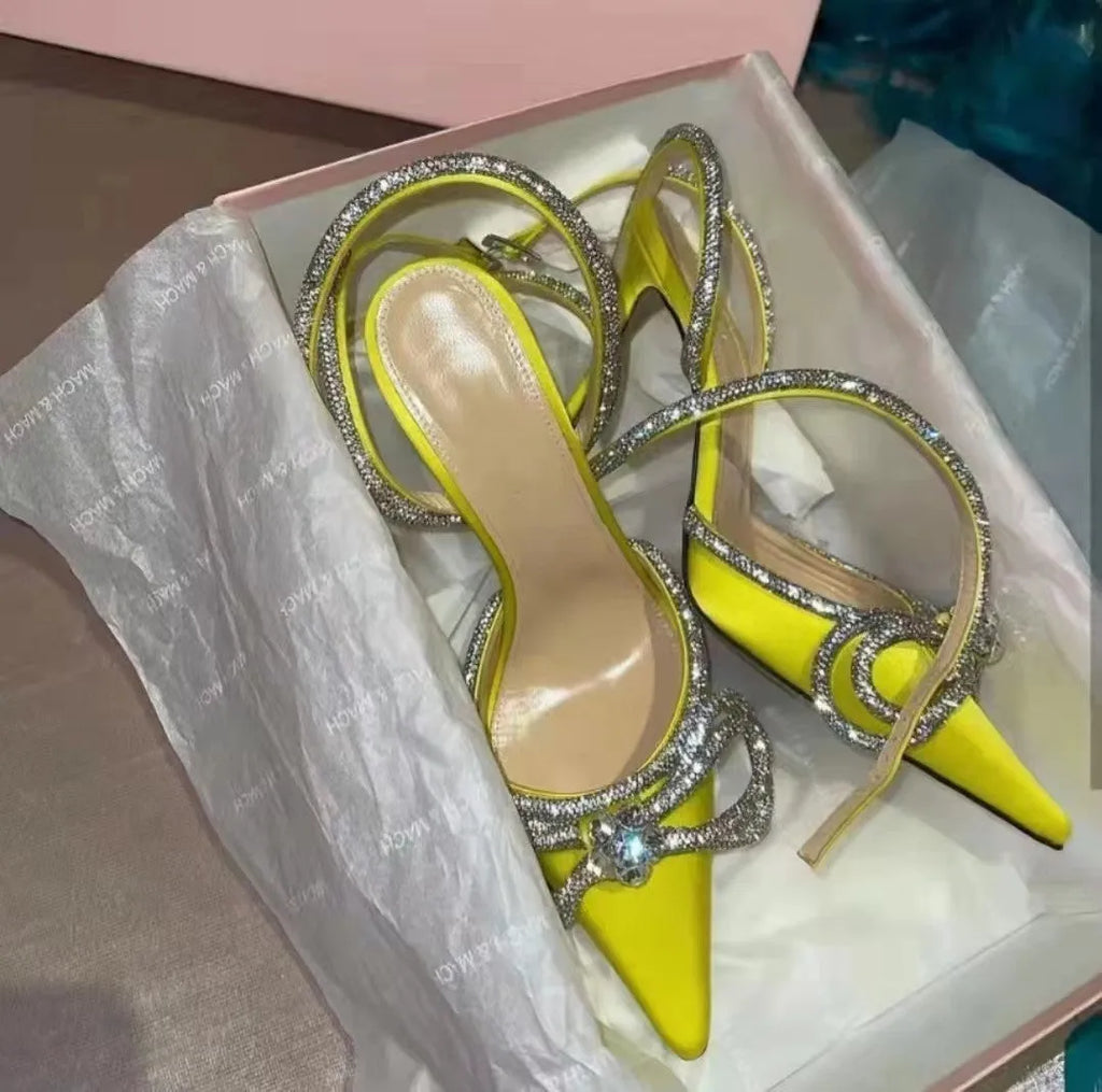 Women's black stiletto heel sandals with silk bandage back and buckle fastening, pointed toe.