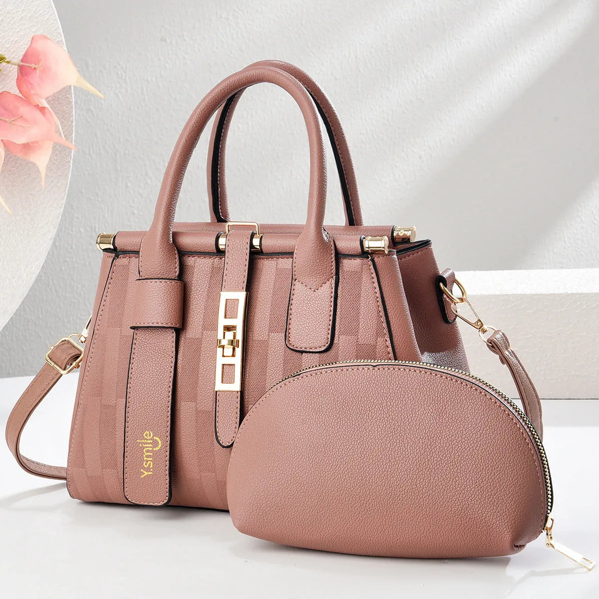 Round PU leather crossbody shoulder bag in black, shown with adjustable strap and measuring 28cm wide.