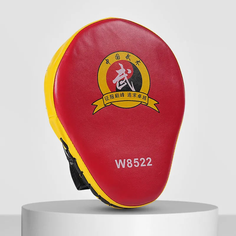 Boxing punch mitts set showing curved and flat hand target styles in red, black, blue, and yellow colour combinations.