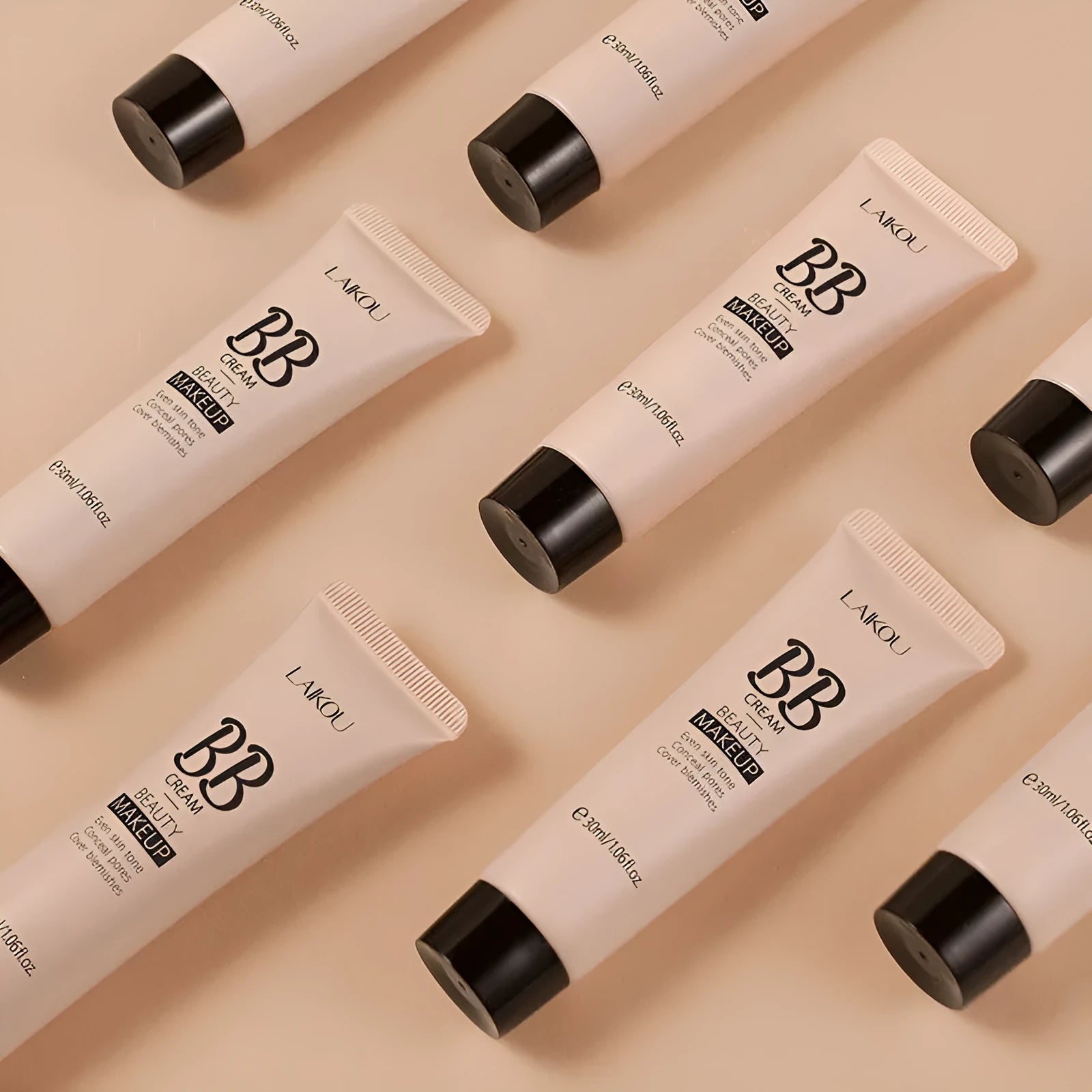 30ml tube of Natural Makeup BB cream shown alongside swatches of its nine skin tone shades.
