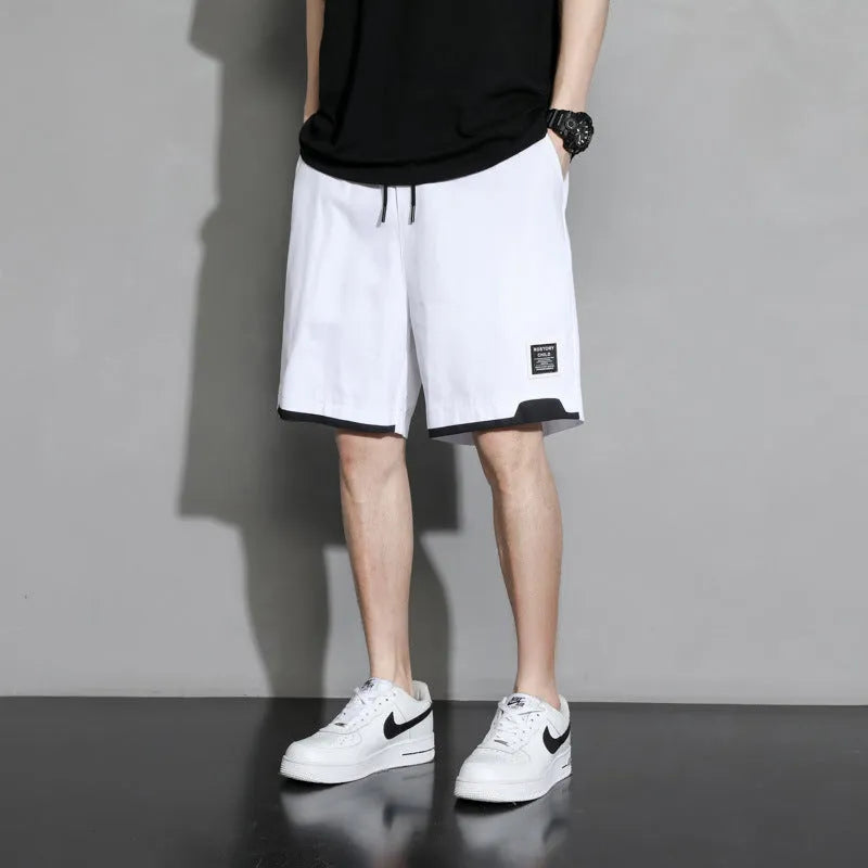 Boy's cotton shorts in black, khaki, or white, shown in Japanese plus sizes.