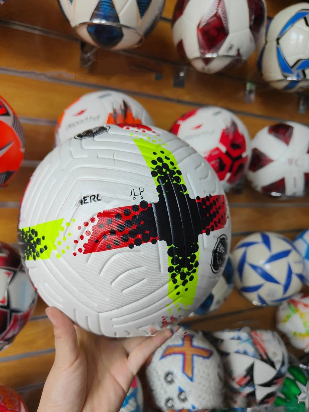 Fluorescent green size 5 football with seamless thermal adhesive patch construction