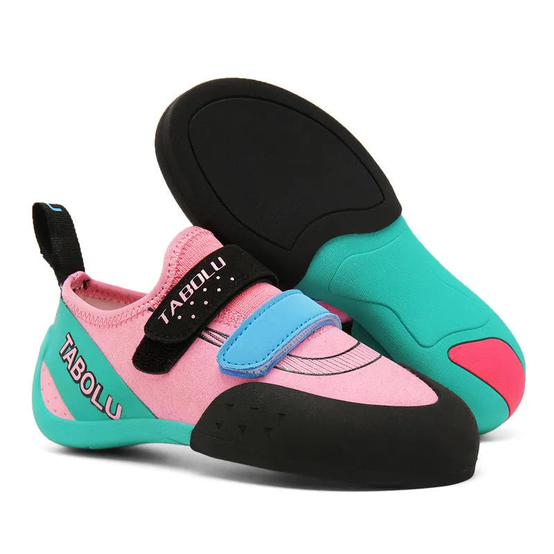 Beginner unisex rock climbing shoes with Velcro strap in black and red colour option.