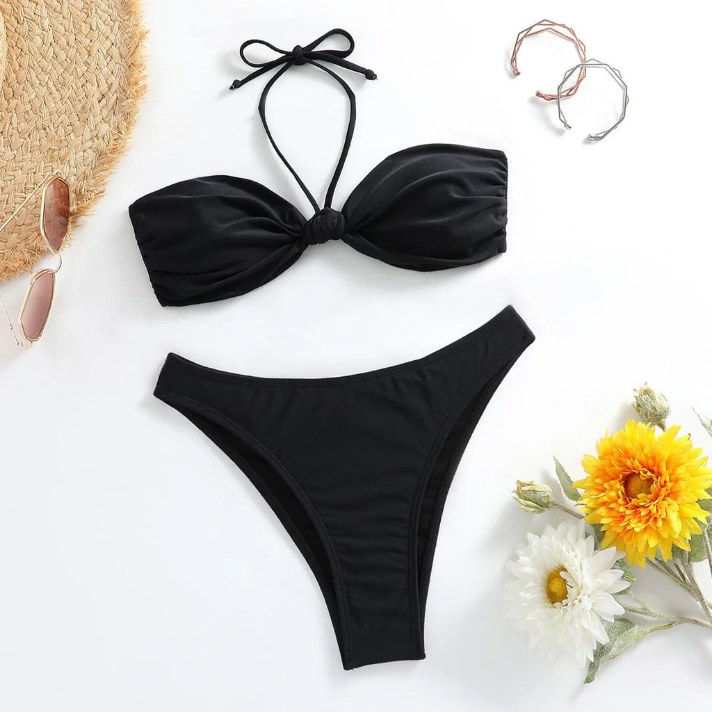 Black women's bikini set with lace-up tube top and matching briefs