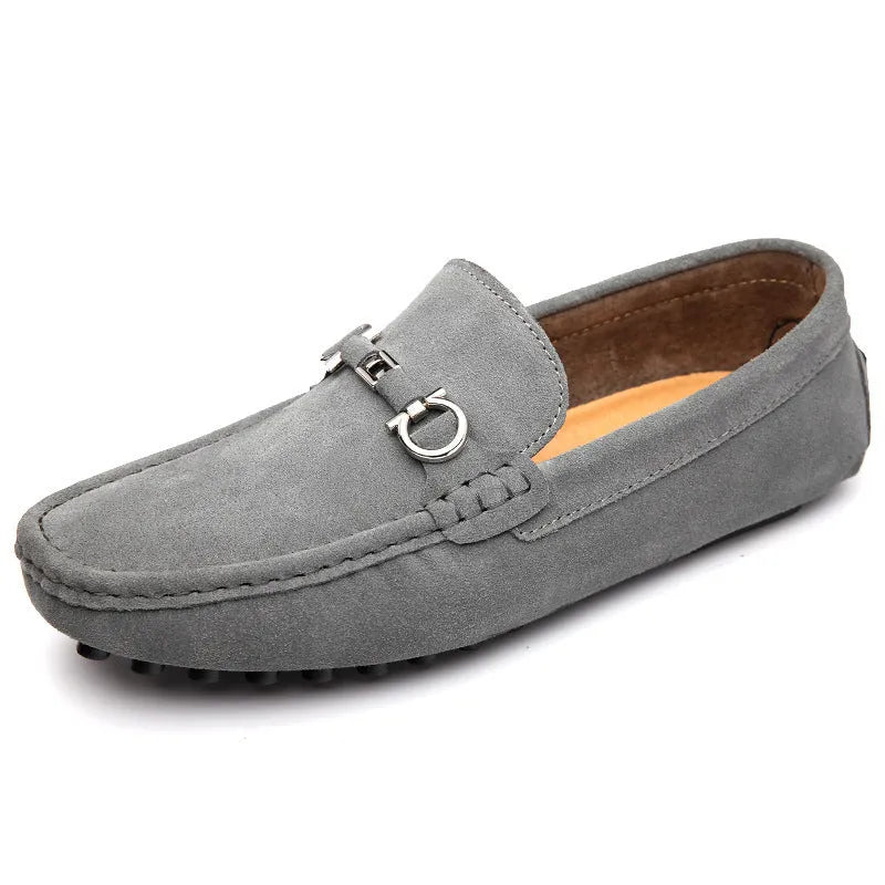 Men's black matte cowhide leather slip-on loafers with a square toe and flat rubber sole.