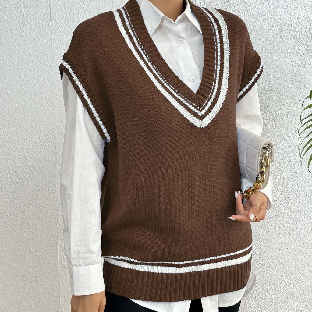 Women's loose-fit acrylic blend vest sweater in college style available in blue, coffee, and black colours
