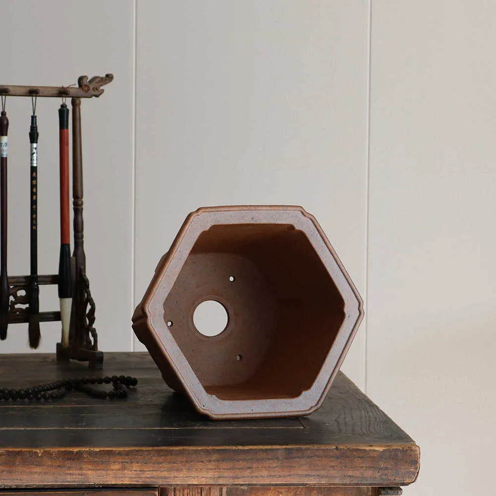 Handmade brown purple clay hexagonal flower pot with raw clay firewood kiln-changed finish, 23cm outer diagonal.