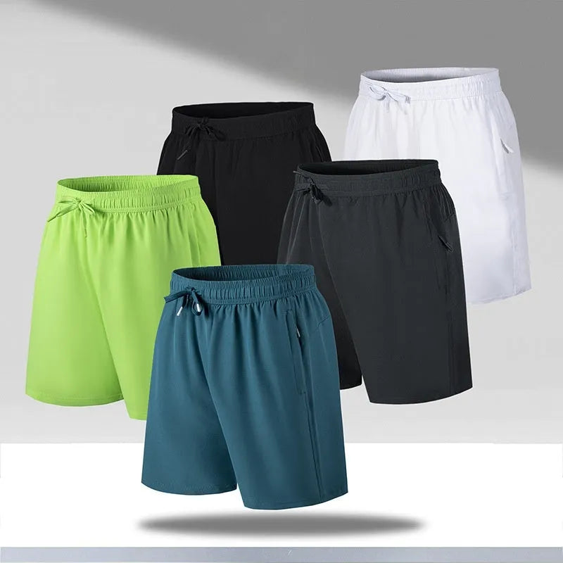 Man wearing loose black quick-dry sports shorts on a beach