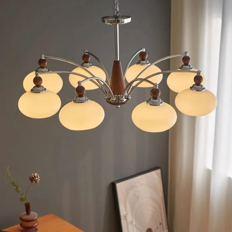Persimmon glass and chrome chandelier with multiple light heads in Middle Ancient style