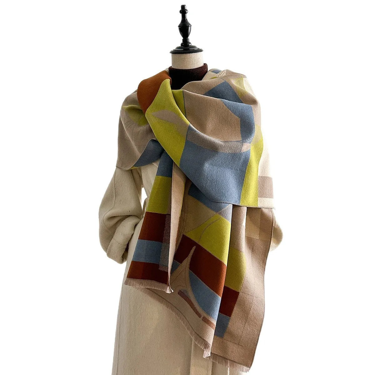 Imitation cashmere polyester scarf in beige colour, showing its 185x65cm size and texture.