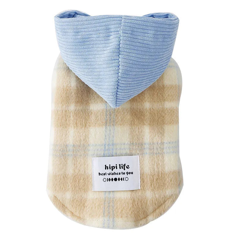 Blue corduroy hooded vest for pets with a grid pattern and traction elements on the hood.