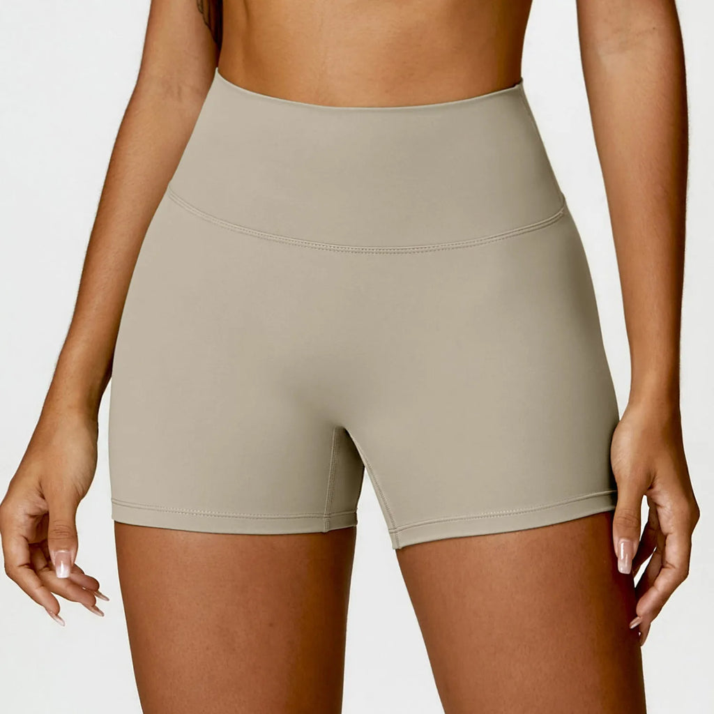 Women's high waist nylon yoga shorts with belly contracting design in basil green colour
