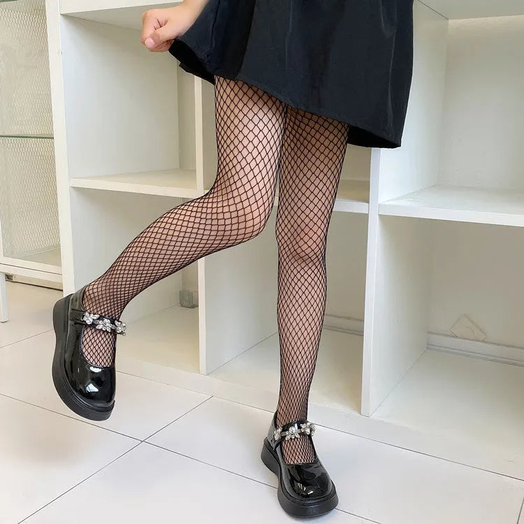 Women's mesh stockings showing large, medium and small net patterns in black and white colours