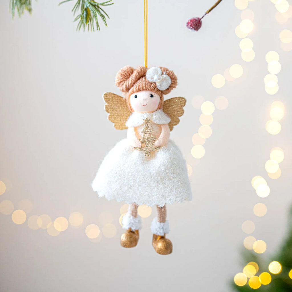 Pink and white cloth angel wings plush Christmas pendant ornament on a branch