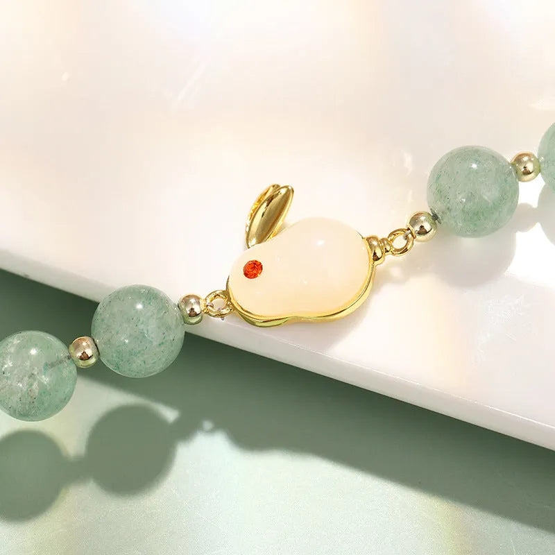 Rabbit bracelet with natural stone charms including green aventurine or strawberry quartz options with mixed metal components