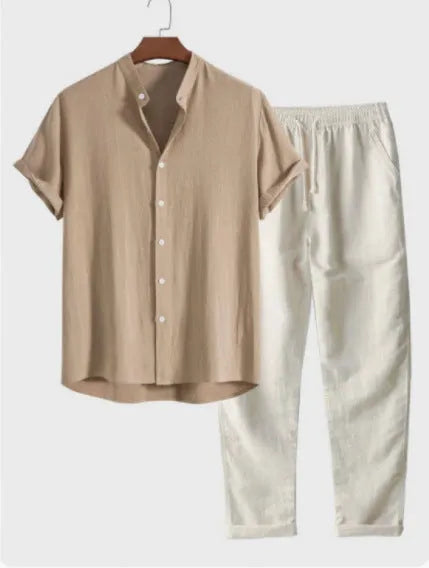 Man wearing a beige loose-fit linen-look short sleeve shirt and matching trousers from a casual suit.