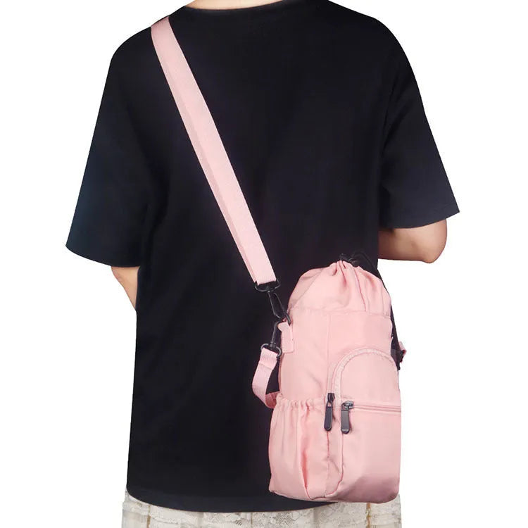 Cloth water bottle pouch with an adjustable crossbody strap in black, green, and pink colour options.