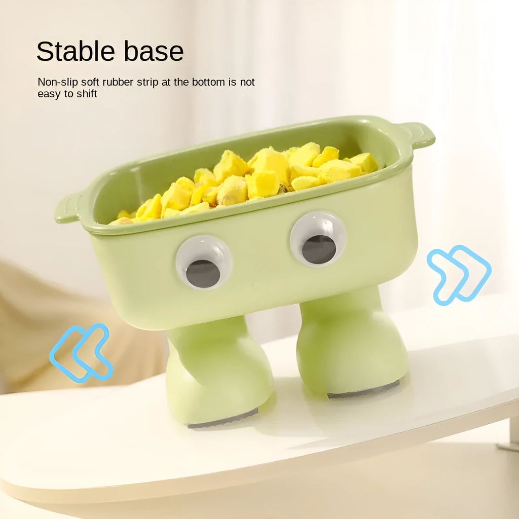 Robot-shaped elevated cat bowl with tilted feeding surface in green colour