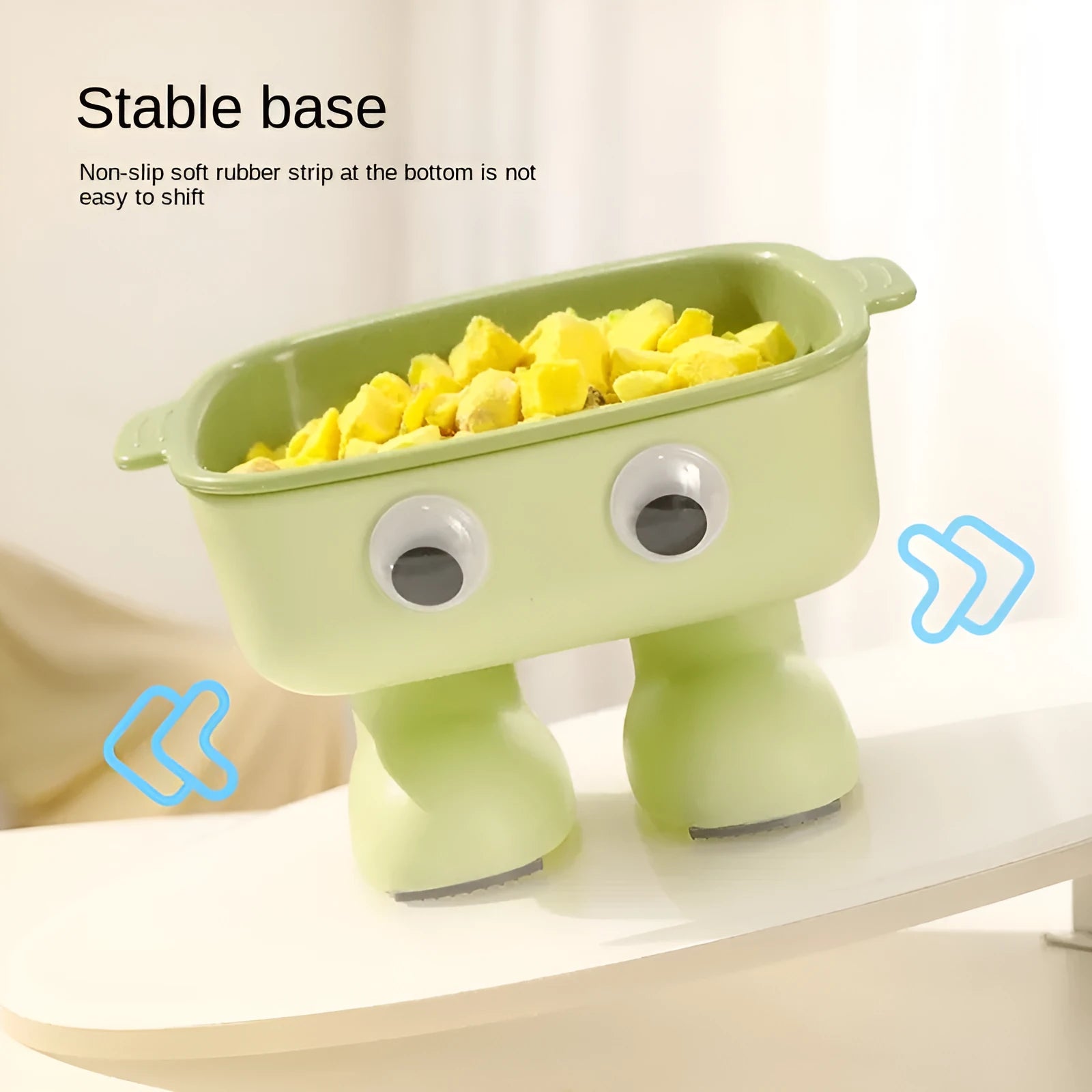 Robot-shaped elevated cat bowl with tilted feeding surface in green colour