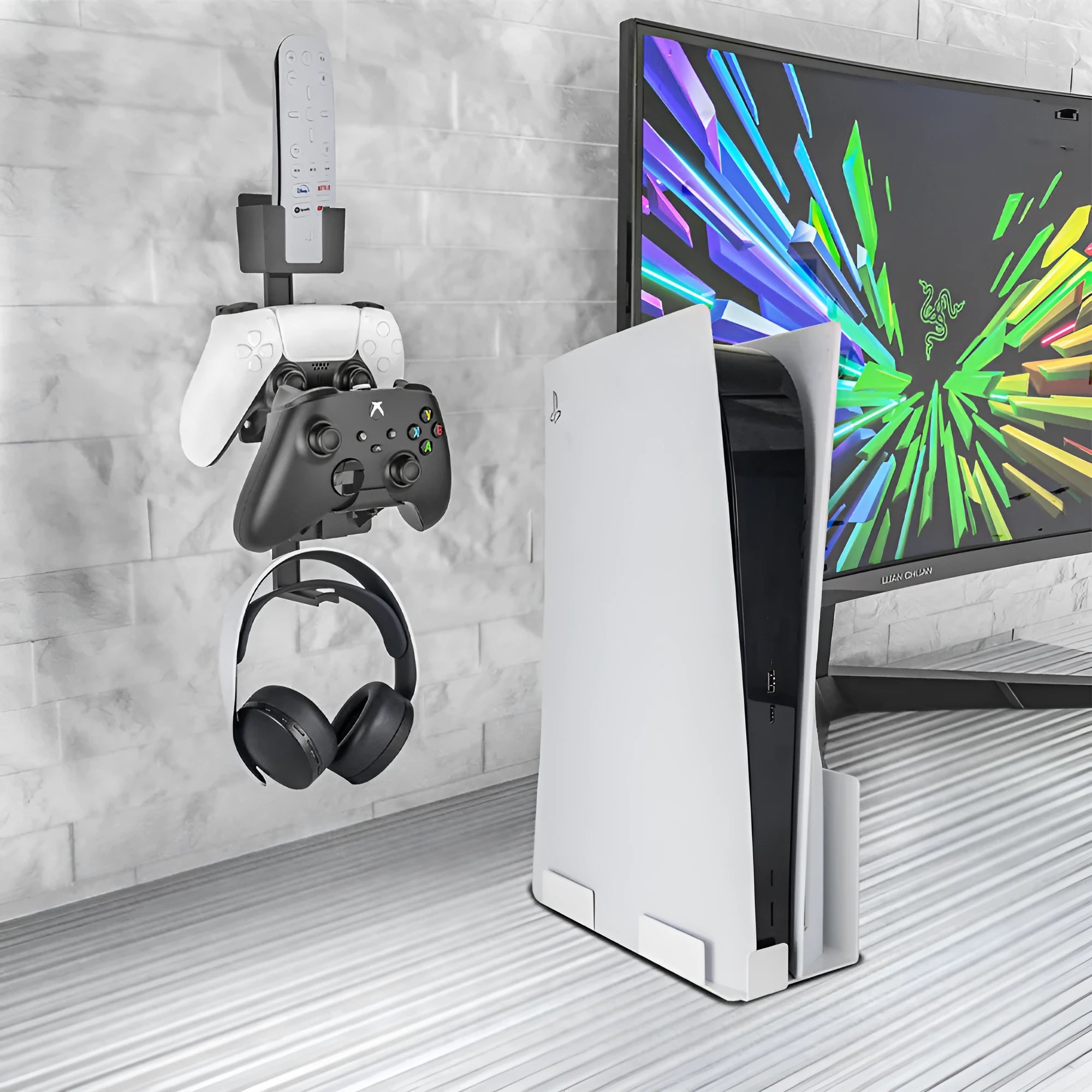 White wall-mounted hook holding PlayStation controller and headset