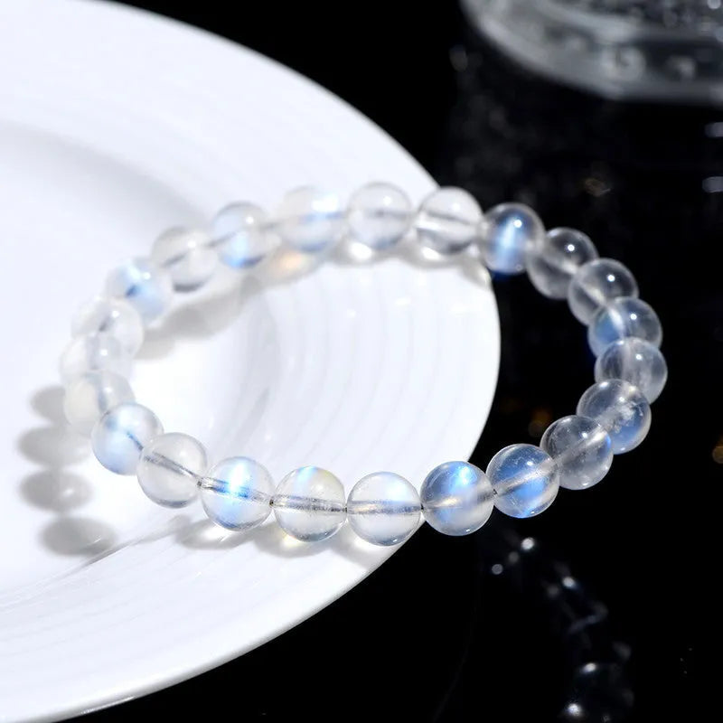Natural Cream Body Blue Moonlight crystal bracelet with smooth ground beads.