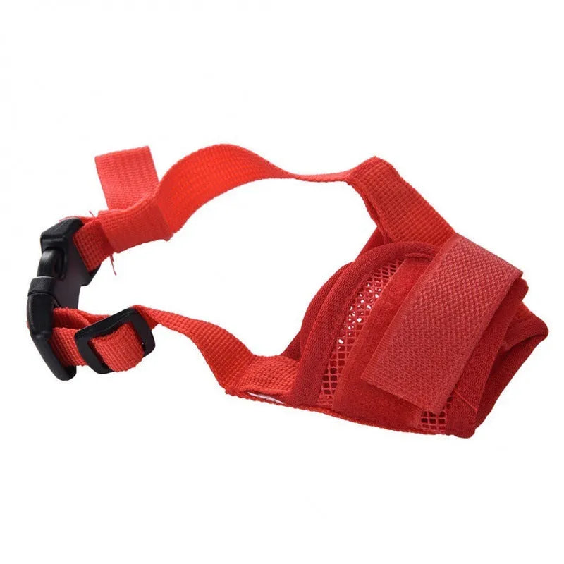 A black adjustable plastic dog muzzle shown on a size chart with options for red, blue, pink, and purple.