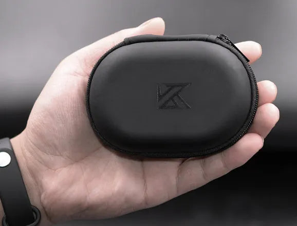 Black oval leather earphone storage pouch for compatible headphone models.