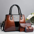 Women's crocodile-stitch three-piece shoulder bag set in blue, showing main bag, small bag, and card bag.