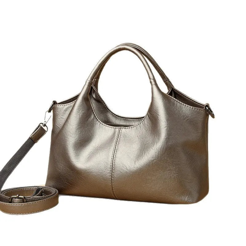 Soft genuine leather women's cross-body bag with large capacity in various colours