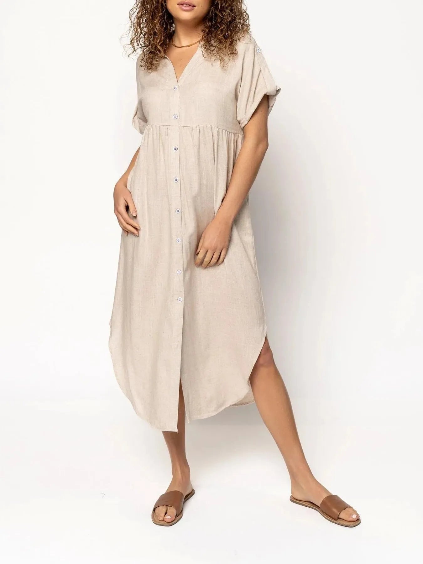 Casual mid-length button-front dress in solid colour with regular sleeves and mid-waist cut