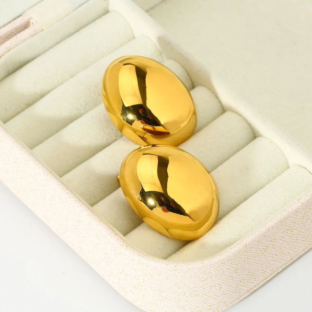 Geometric stainless steel ear studs with gold plating and glazed surface in DFE139 colour