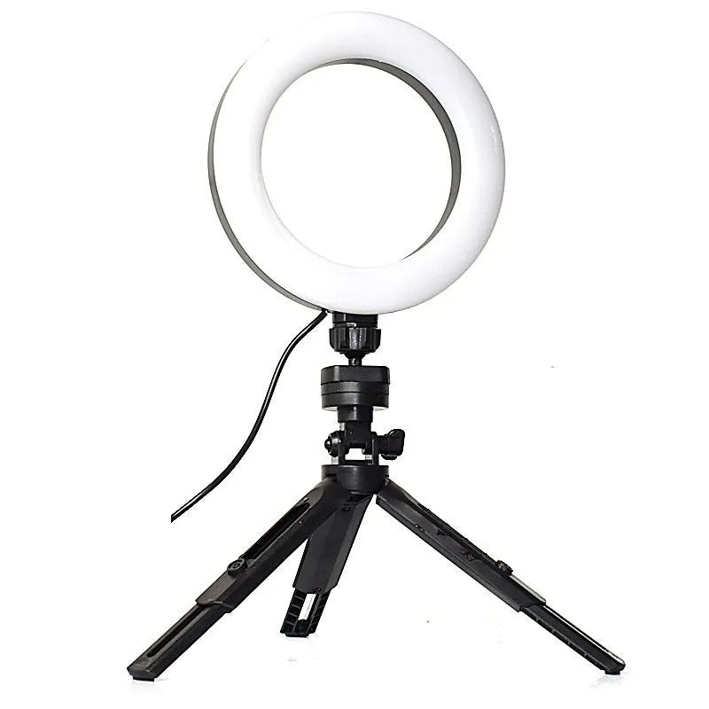 Black universal mobile phone selfie bracket with adjustable colour fill light on a desktop tripod.