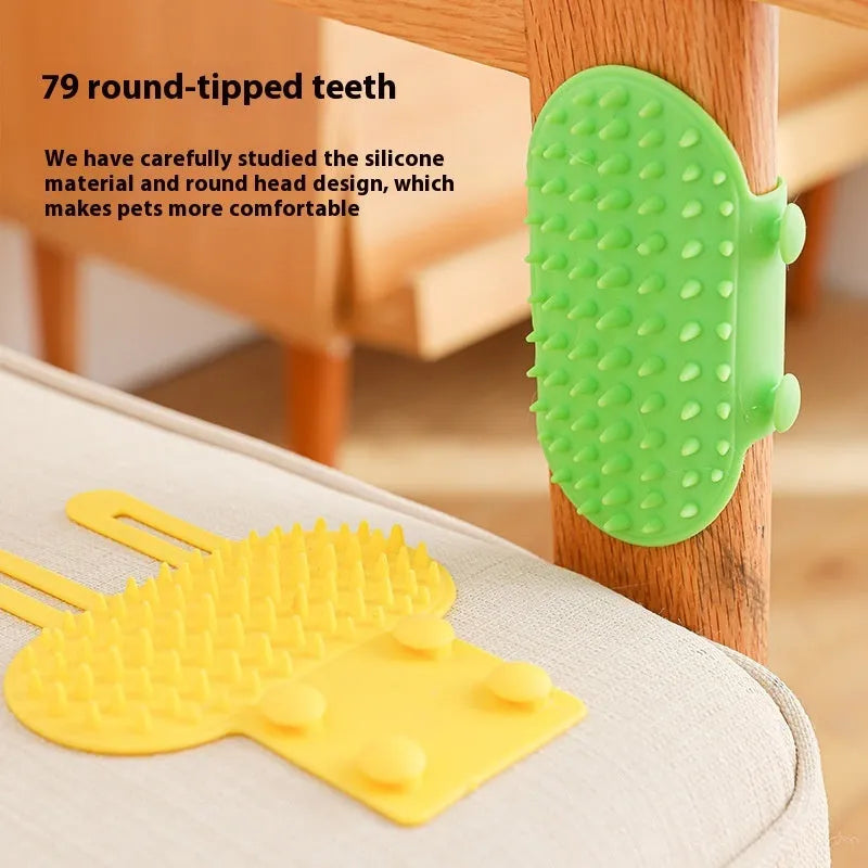 Silicone wall-mounted cat grooming brush with comb teeth and adjustable strap for table legs.