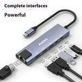 Aluminium Steam Deck six-in-one docking station with Type-C cable, HDMI, Ethernet, and USB ports.