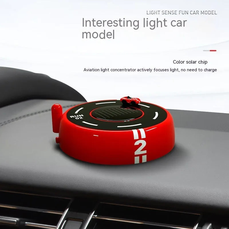 Round solar-powered car aromatherapy decoration with light sense model features in black red or white plastic