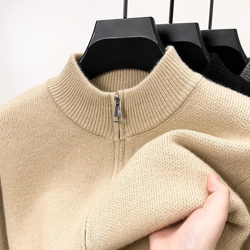 Men's black knitted zipper cardigan with stand collar showing front zip and loose fit