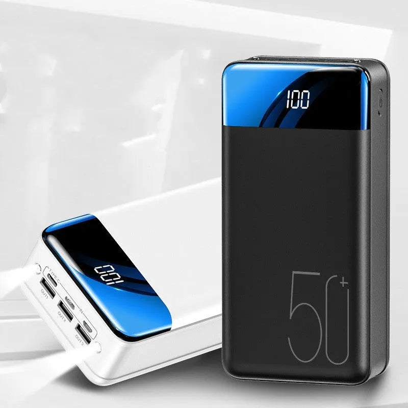 Large 50000mAh power bank with three USB ports in black or white plastic case
