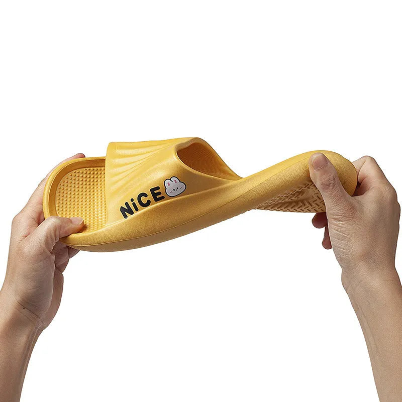 Unisex adult EVA flip flop slippers with cartoon pattern in multiple colours on a non-slip sole.