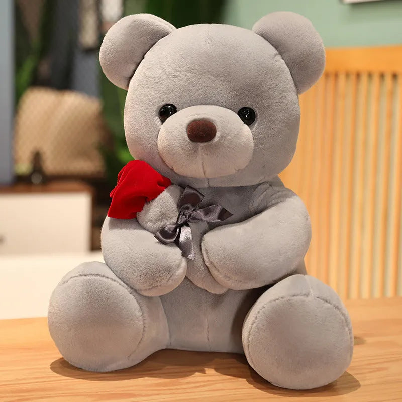 Rose bear plush toy in beige, brown, or grey, shown in sizes from 23cm to 45cm.